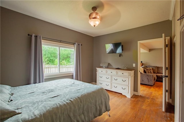 7610 NE Bacon Rd, Cameron, MO 64429 - bedroom featuring light wood-style floors and baseboards