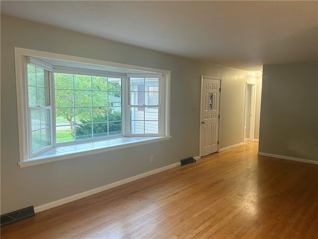 1923 Seneca St, Leavenworth, KS 66048 - unfurnished room featuring light wood-style flooring and baseboards