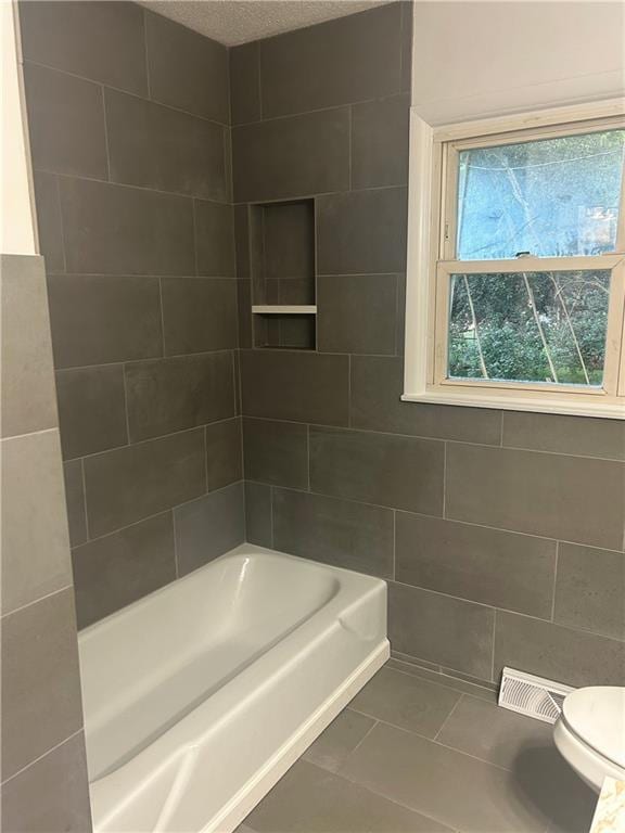 1923 Seneca St, Leavenworth, KS 66048 - full bathroom with shower / bathtub combination and tile patterned flooring
