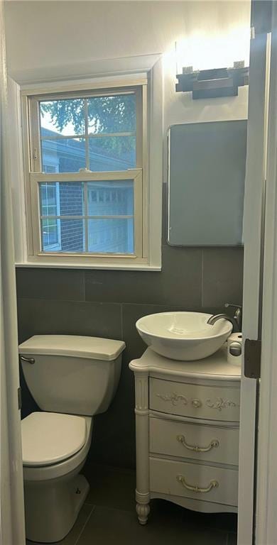 1923 Seneca St, Leavenworth, KS 66048 - bathroom featuring vanity and toilet
