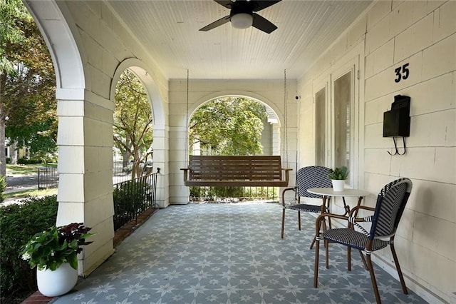 35 W 70th St, Kansas City, MO 64113 - covered porch with ceiling fan