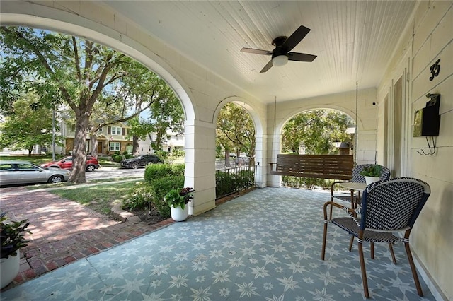 35 W 70th St, Kansas City, MO 64113 - covered porch featuring ceiling fan