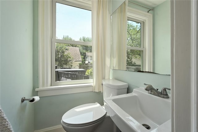 35 W 70th St, Kansas City, MO 64113 - bathroom featuring a sink and toilet