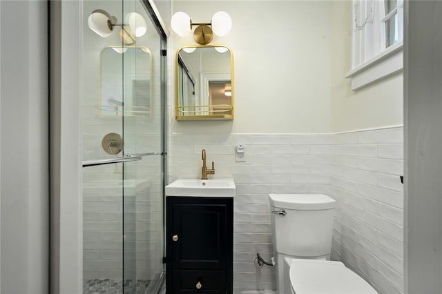 35 W 70th St, Kansas City, MO 64113 - full bathroom featuring a stall shower, vanity, and tile walls