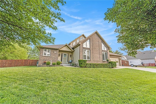 15417 Poplar St, Basehor, KS 66007 - view of front of home with brick siding, an attached garage, and driveway