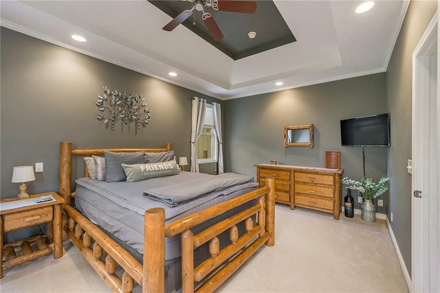 15417 Poplar St, Basehor, KS 66007 - bedroom featuring light colored carpet, recessed lighting, baseboards, a tray ceiling, and crown molding
