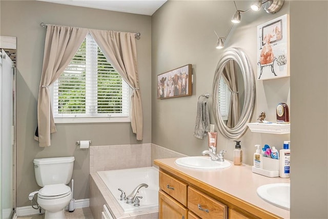 15417 Poplar St, Basehor, KS 66007 - bathroom with a bath, double vanity, and toilet