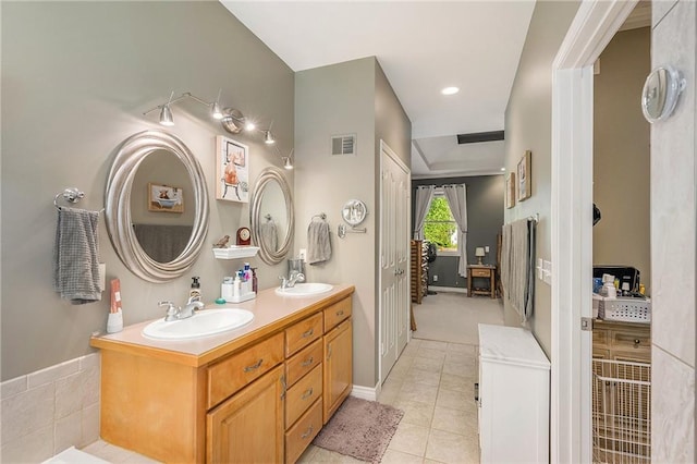 15417 Poplar St, Basehor, KS 66007 - full bath with double vanity and tile patterned floors