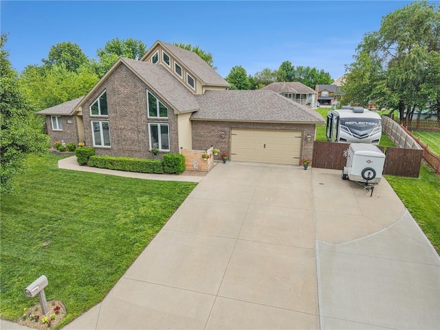 15417 Poplar St, Basehor, KS 66007 - view of front of property with brick siding, an attached garage, concrete driveway, and a shingled roof