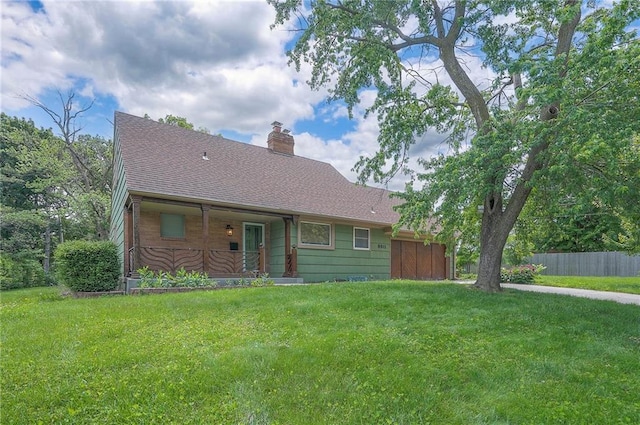 8811 W 66th Ter, Mission, KS 66202 - view of front of home with a chimney, a porch, and a shingled roof