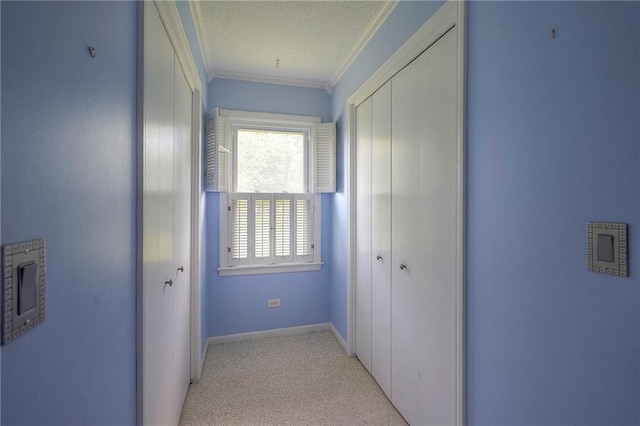8811 W 66th Ter, Mission, KS 66202 - hallway featuring crown molding, light carpet, baseboards, and a textured ceiling