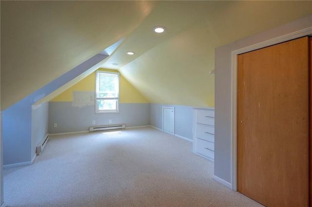 8811 W 66th Ter, Mission, KS 66202 - additional living space with baseboard heating, lofted ceiling, carpet floors, recessed lighting, and baseboards