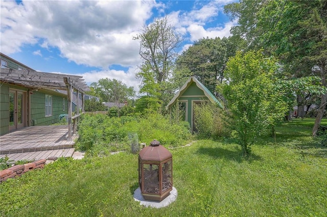 8811 W 66th Ter, Mission, KS 66202 - view of grassy yard with a wooden deck
