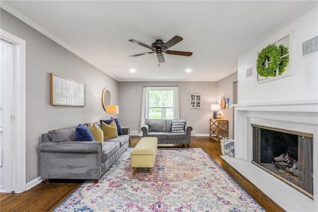 10100 E Sheley Rd, Independence, MO 64052 - living room featuring a ceiling fan, wood finished floors, baseboards, a fireplace, and recessed lighting