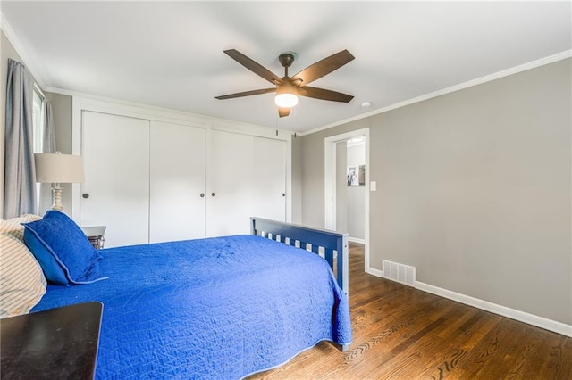 10100 E Sheley Rd, Independence, MO 64052 - bedroom featuring wood finished floors, baseboards, ornamental molding, and a ceiling fan