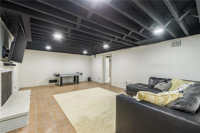 10100 E Sheley Rd, Independence, MO 64052 - tiled living area with a fireplace