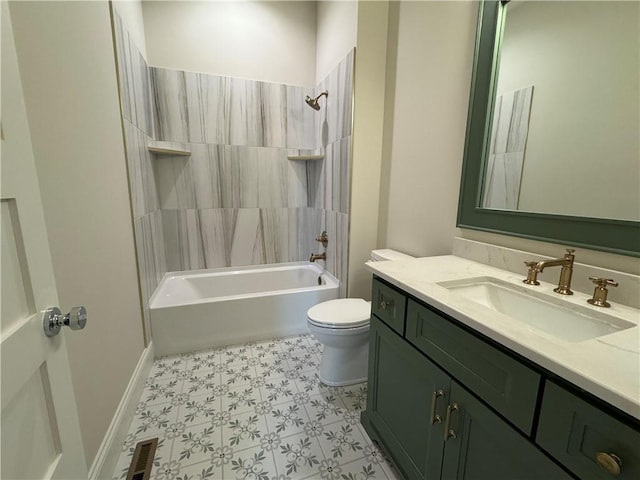 22428 W 90th Ter, Lenexa, KS 66227 - bathroom featuring toilet, vanity, shower / tub combination, and tile patterned floors