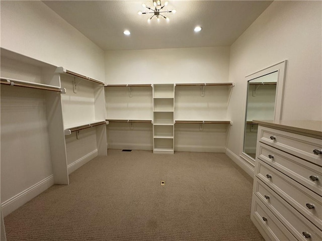 22428 W 90th Ter, Lenexa, KS 66227 - spacious closet with a chandelier and light colored carpet