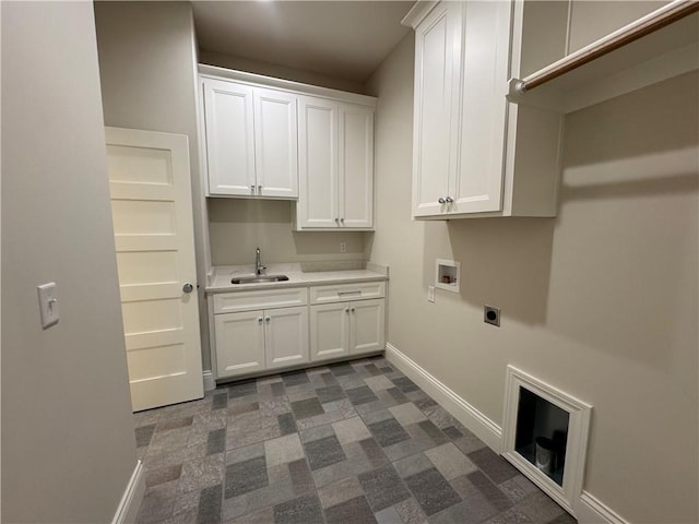 22428 W 90th Ter, Lenexa, KS 66227 - laundry room with cabinet space, electric dryer hookup, baseboards, and hookup for a washing machine