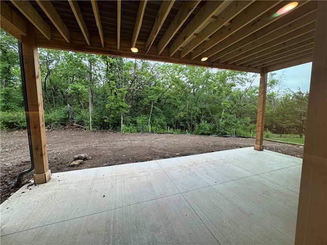 22428 W 90th Ter, Lenexa, KS 66227 - view of patio with a forest view