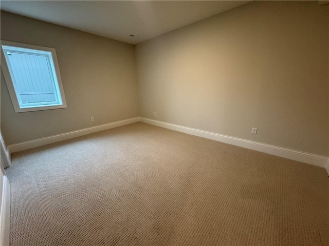 22428 W 90th Ter, Lenexa, KS 66227 - unfurnished room with light carpet and baseboards