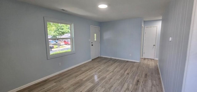 2918 S 52nd Ter, Kansas City, KS 66106 - spare room with wood finished floors and baseboards