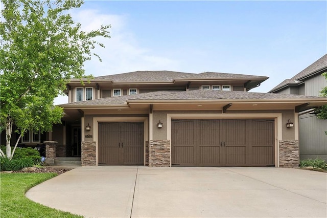 24901 W 91st Pl, Lenexa, KS 66227 - prairie-style home with stone siding, an attached garage, driveway, and stucco siding