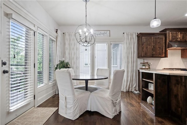 24901 W 91st Pl, Lenexa, KS 66227 - dining room with a chandelier and dark wood-style flooring
