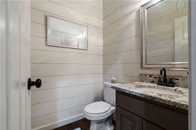 24901 W 91st Pl, Lenexa, KS 66227 - bathroom featuring toilet, vanity, and wood finished floors