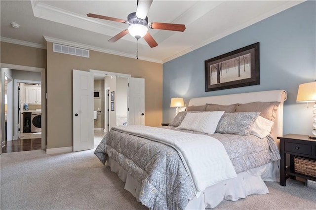 24901 W 91st Pl, Lenexa, KS 66227 - bedroom with light carpet, crown molding, washer / clothes dryer, a raised ceiling, and a ceiling fan