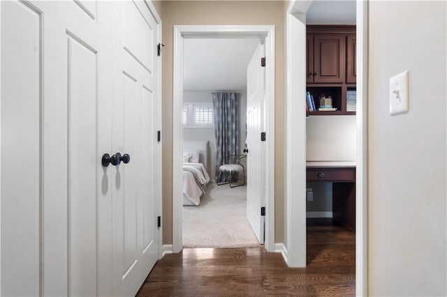 24901 W 91st Pl, Lenexa, KS 66227 - hall featuring dark wood-style flooring and baseboards