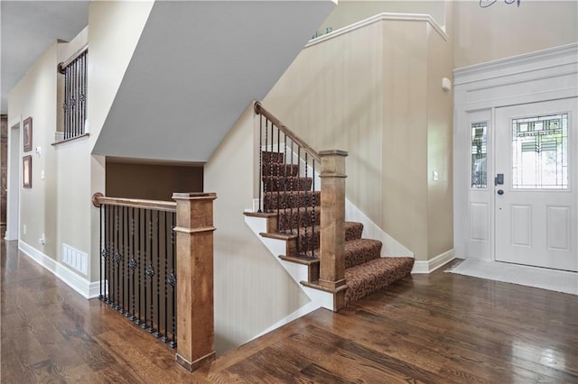 24901 W 91st Pl, Lenexa, KS 66227 - entrance foyer with wood finished floors, baseboards, and stairway