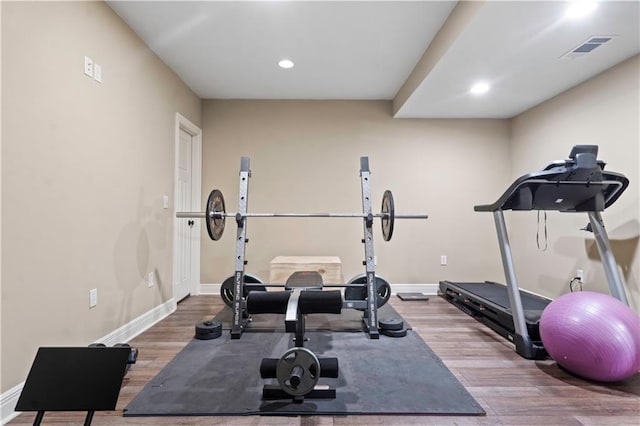 24901 W 91st Pl, Lenexa, KS 66227 - workout room featuring wood finished floors, baseboards, and recessed lighting