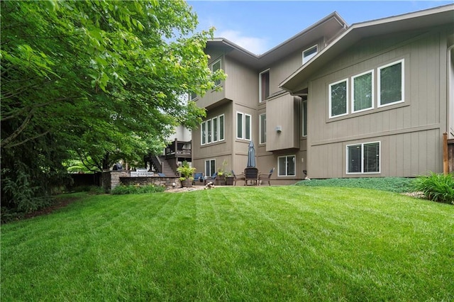 24901 W 91st Pl, Lenexa, KS 66227 - back of property with a yard and a patio area