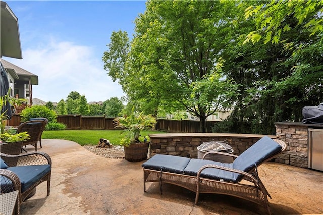 24901 W 91st Pl, Lenexa, KS 66227 - view of patio with an outdoor fire pit