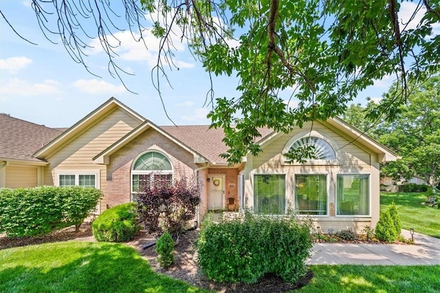 2051 W 139th Ter, Leawood, KS 66224 - view of front of property featuring a front yard, brick siding, and a shingled roof