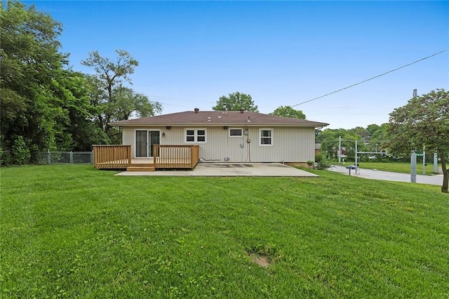 210 Murray Rd, Lees Summit, MO 64081 - rear view of house featuring a wooden deck and a patio area