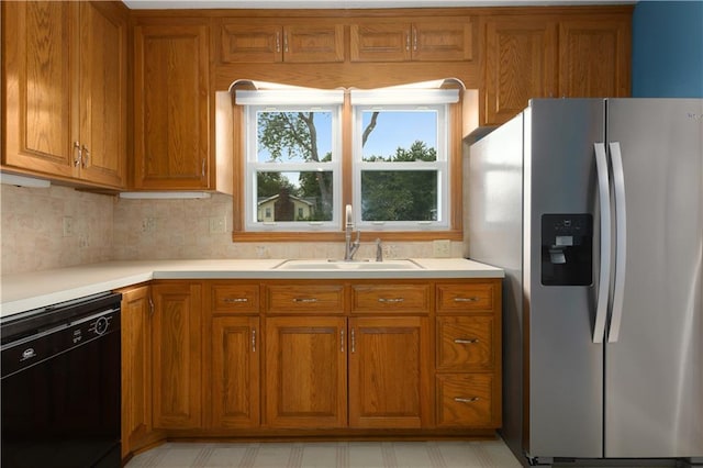 210 Murray Rd, Lees Summit, MO 64081 - kitchen featuring stainless steel fridge with ice dispenser, black dishwasher, a sink, brown cabinetry, and decorative backsplash