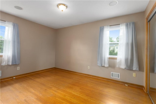 210 Murray Rd, Lees Summit, MO 64081 - unfurnished room featuring light wood-type flooring and baseboards