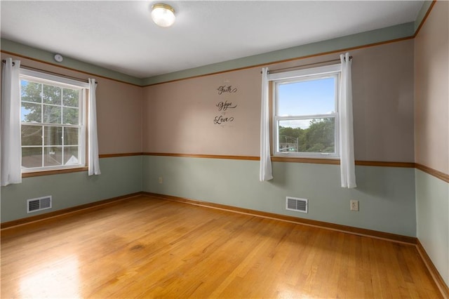 210 Murray Rd, Lees Summit, MO 64081 - unfurnished room featuring light wood-type flooring and baseboards