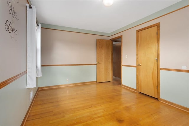 210 Murray Rd, Lees Summit, MO 64081 - empty room featuring light wood-type flooring