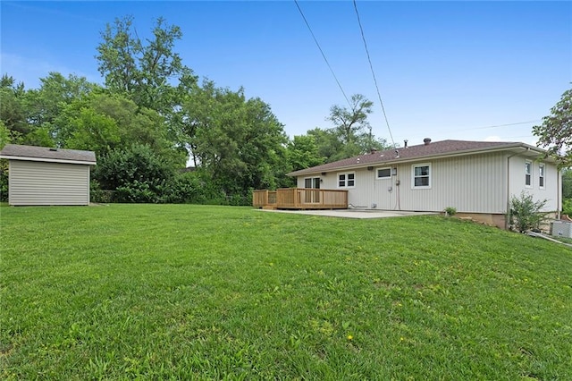 210 Murray Rd, Lees Summit, MO 64081 - view of green lawn with a wooden deck