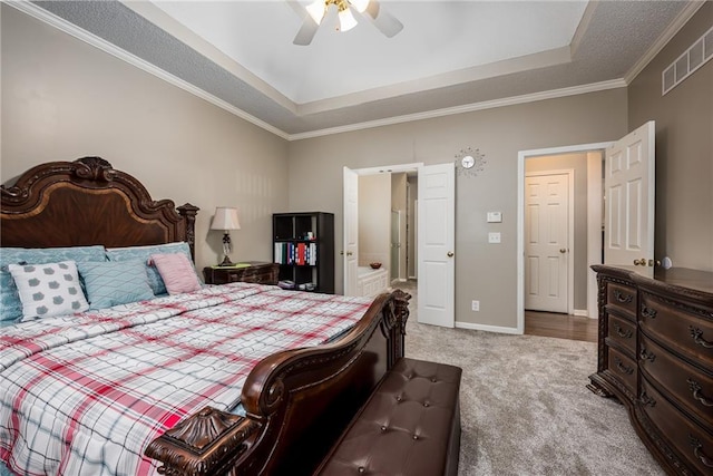 4422 N 122nd Ter, Kansas City, KS 66109 - bedroom featuring a raised ceiling, light colored carpet, ornamental molding, baseboards, and ceiling fan