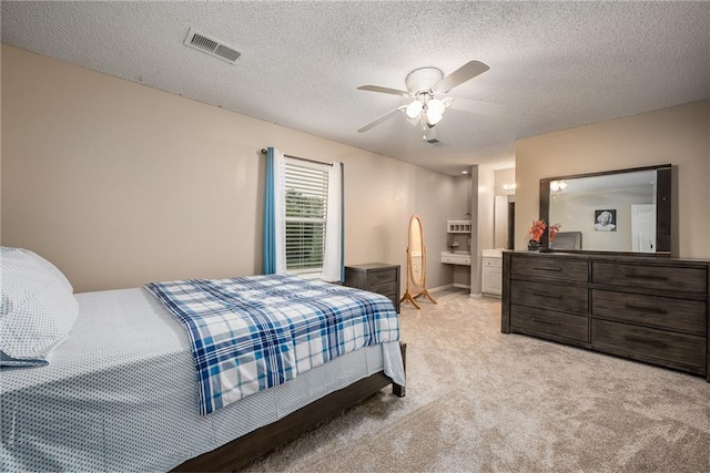 4422 N 122nd Ter, Kansas City, KS 66109 - bedroom with light carpet, a textured ceiling, and ceiling fan