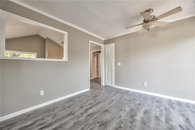 14033 Dornoch St, Grandview, MO 64030 - empty room with wood finished floors, ceiling fan, a textured ceiling, baseboards, and ornamental molding