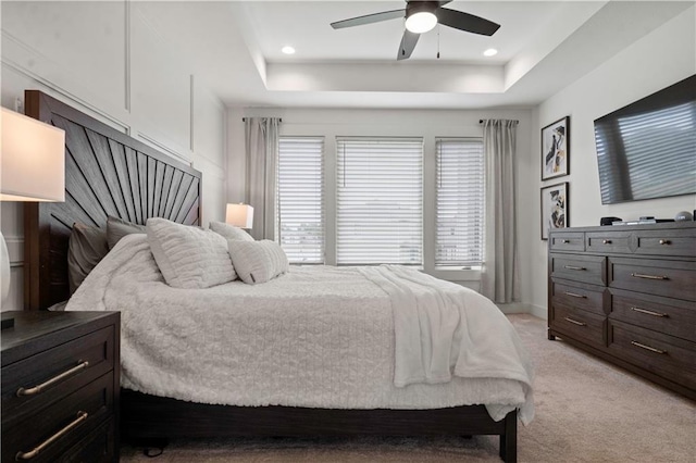 15318 W 172nd Pl, Olathe, KS 66062 - bedroom with a tray ceiling, light carpet, a ceiling fan, baseboards, and recessed lighting