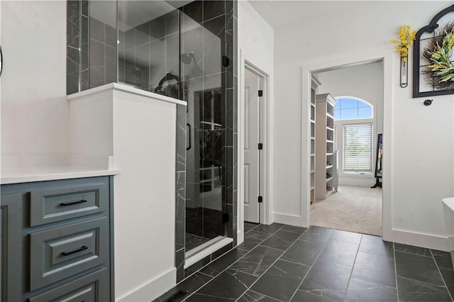 15318 W 172nd Pl, Olathe, KS 66062 - full bath with baseboards, a shower stall, marble look tiles, and a soaking tub