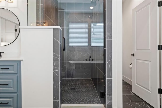15318 W 172nd Pl, Olathe, KS 66062 - bathroom featuring marble look tile flooring, a stall shower, and vanity