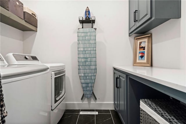 15318 W 172nd Pl, Olathe, KS 66062 - laundry room featuring independent washer and dryer, cabinet space, and baseboards