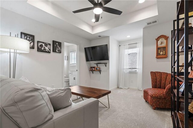 15318 W 172nd Pl, Olathe, KS 66062 - living area with ceiling fan, carpet flooring, a raised ceiling, healthy amount of natural light, and recessed lighting